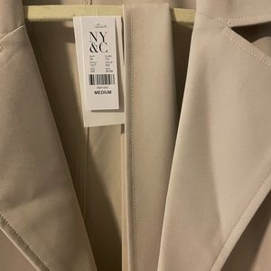 Tan size medium trench coat with belt